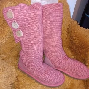 Pink high 3 button Ugg boots worn with a lot of life still left.